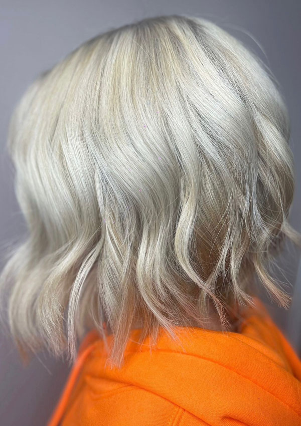 Lady with new blonde colour service