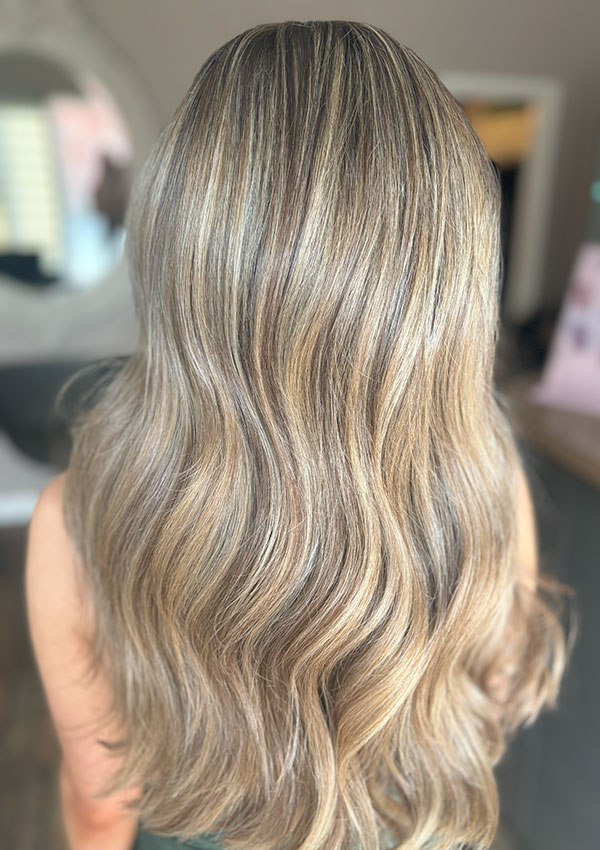 Lady with new blonde hair in Wrexham